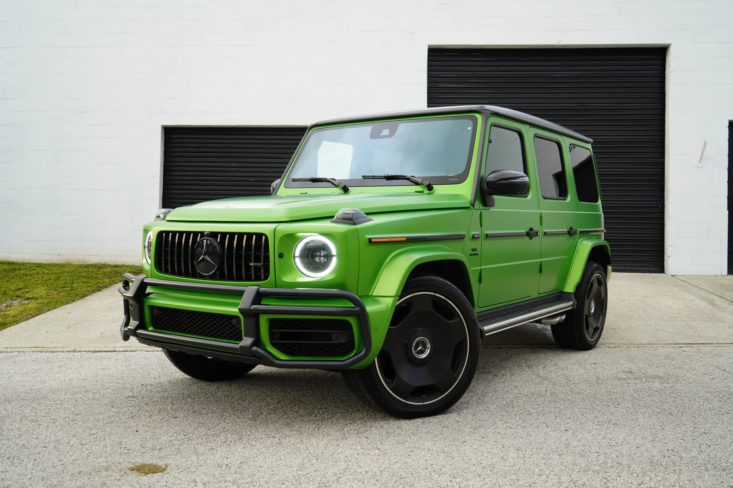 Green Mercedes-Benz AMG G63 affordable luxury car rental in Orlando