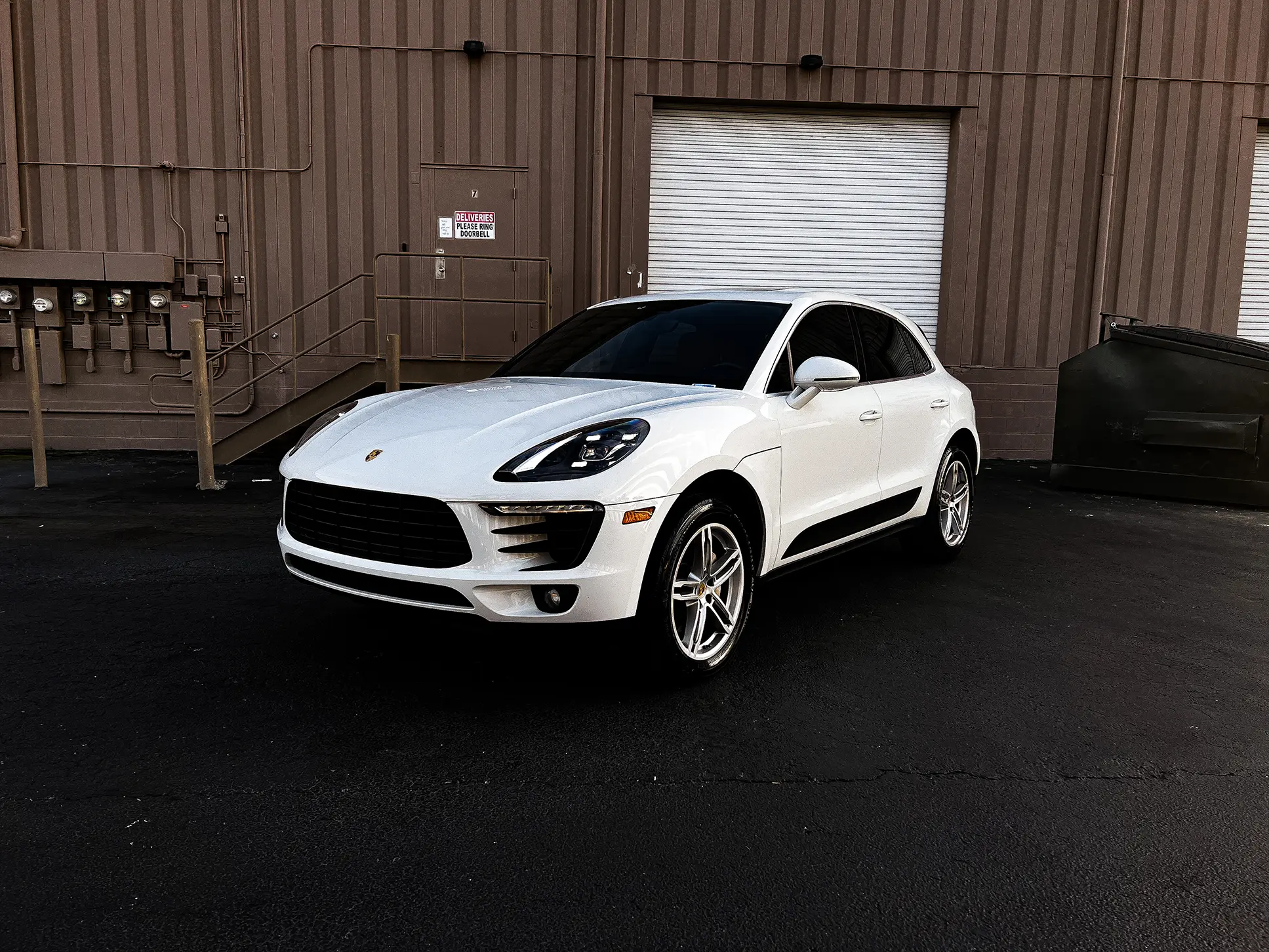 White Porsche Mecan S luxury rental car in Orlando